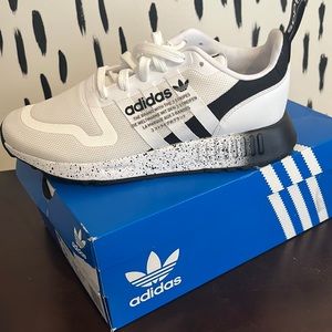 Adidas tennis shoes. Wore only once